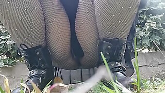 A Wife Pees In A Public Park And Exposes Her Vagina While Wearing Fishnet Stockings